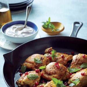 Curried chicken thighs with pomegranate-mint sauce