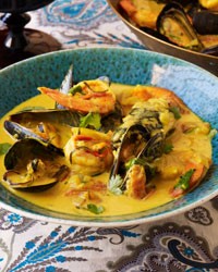 Curried coconut-seafood soup (Seafood rassa)