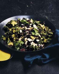 Curried kale and quinoa salad with almonds and raisins