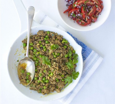 Curried lamb and peas with tomato and onion salad