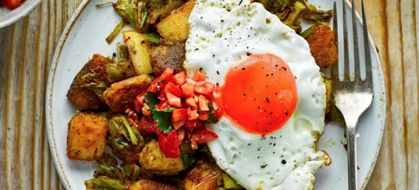 Curried leek and potato hash with fried eggs