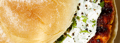 Curried salmon burgers with yogurt sauce