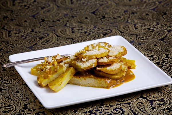 Curried scalloped potatoes and tempeh with coconut milk