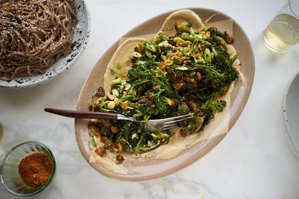 Curried sheet pan broccoli with peanuts and tahini