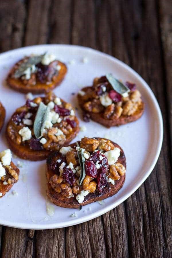 Curried sweet potato rounds with honeyed walnuts, cranberries and blue cheese
