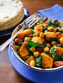 Curried sweet potatoes with chard and chickpeas