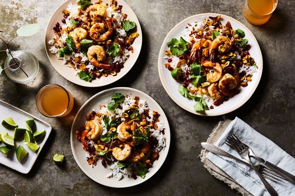 Curry-coconut shrimp and rice salad with pomegranate and lime