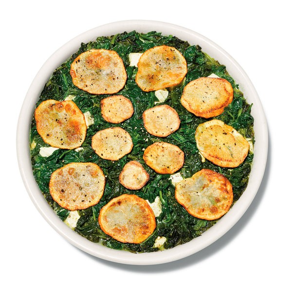 Curry-creamed spinach and pork stew with potato crust