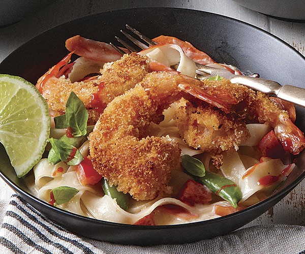 Curry-crusted shrimp with coconut noodles