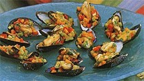 Curry-marinated mussels on the half shell