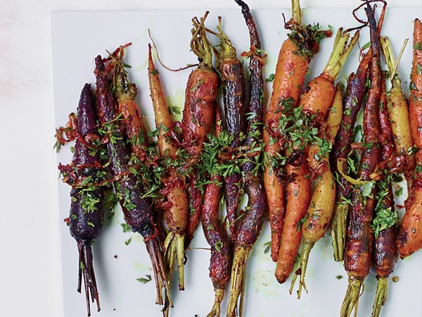 Curry-roasted carrots with carrot top gremolata [Kay Chun]