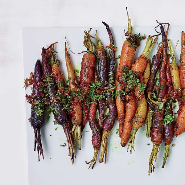 Curry-roasted carrots with carrot top gremolata