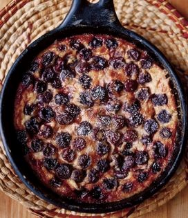 Custard and cherries baked in a skillet (Clafoutis aux cerises)