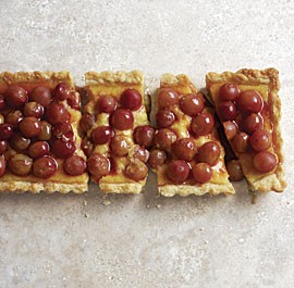 Custard tart with wine-poached grapes