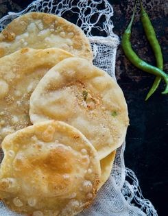 Dadi's puris with poppy seeds and green chilli