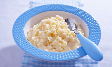Dairy-free rice pudding with warm mango sauce