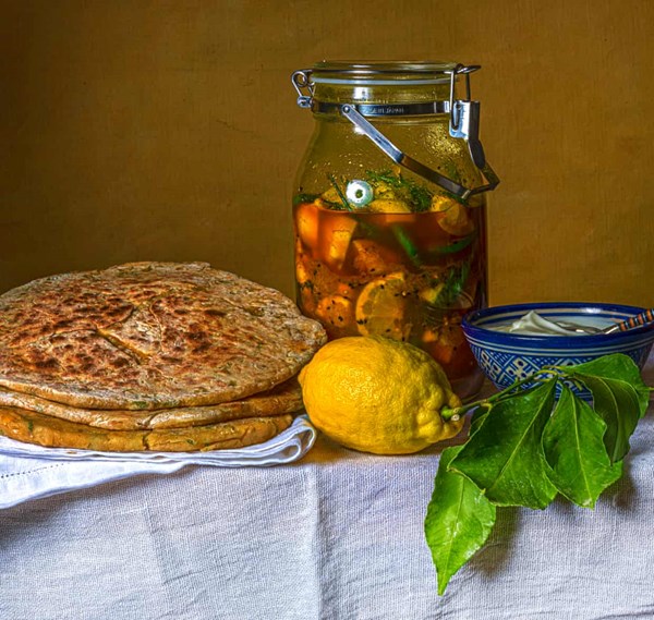 Dal and fenugreek parathas with lemon pickle and yogurt