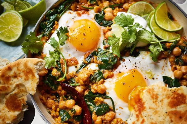 Dal baked eggs with herby yogurt & naan