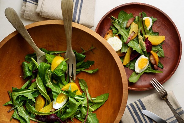 Dandelion salad with beets, bacon and goat cheese toasts
