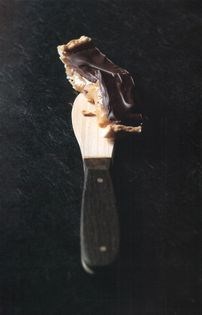 Dark chocolate and soft caramel tart with toasted almond pastry