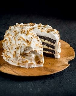 Dark chocolate cake with white chocolate ganache and marshmallow frosting