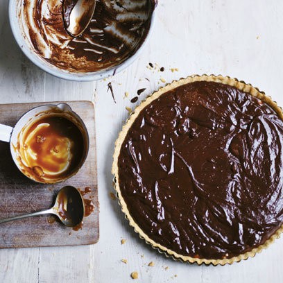 Dark chocolate, chilli caramel and macadamia nut tart