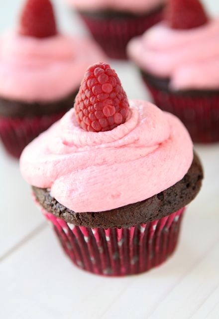 Dark chocolate cupcakes with raspberry buttercream frosting