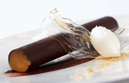 Dark chocolate cylinder with smoked hazelnut praline and salted milk ice cream