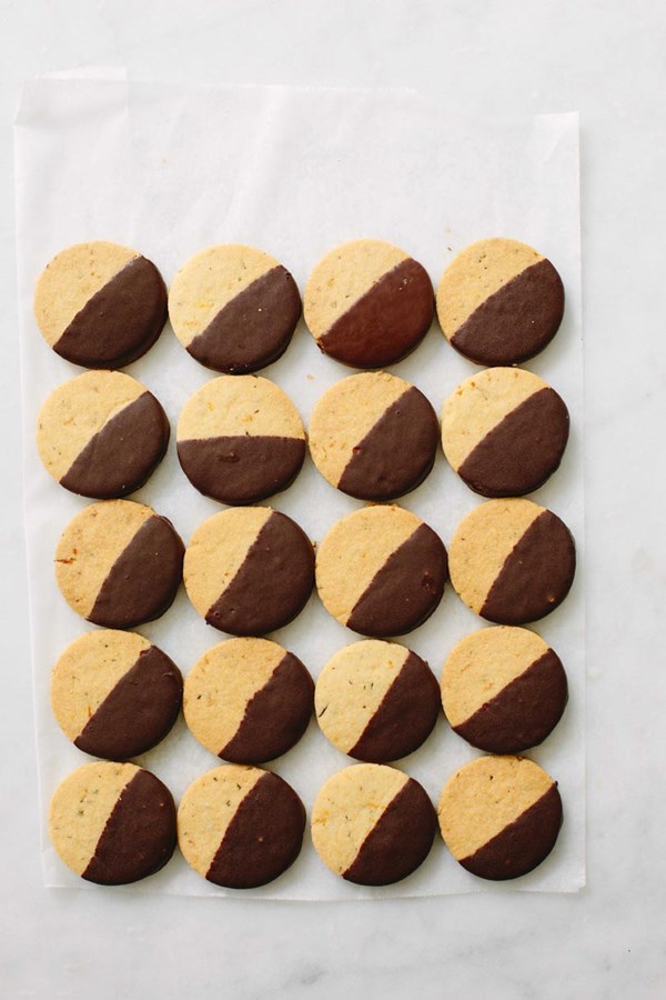 Dark chocolate-dipped orange & rosemary biscuits