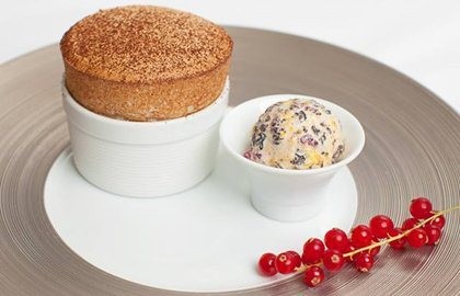 Dark chocolate soufflé with Christmas pudding ice cream and cinnamon sugar