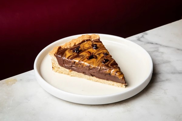 Dark chocolate tart with chilli oil-infused caramel