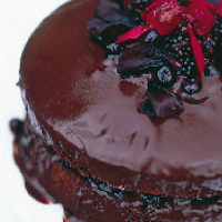 Dark fruits and flowers chocolate cake