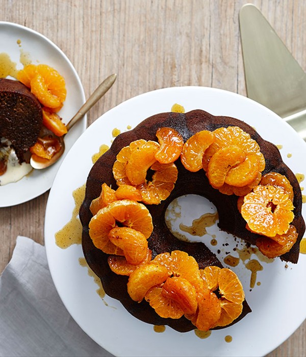 Dark gingerbread cake with mandarin compote