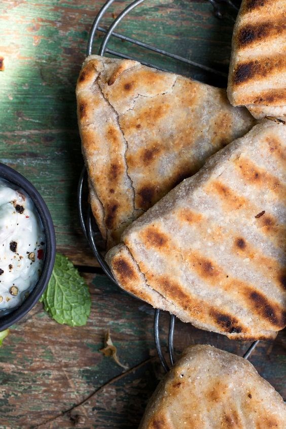 Date-stuffed parathas with yogurt dip