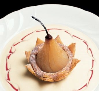 Date-stuffed poached pears in phyllo crowns with brandied mousseline sauce