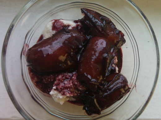 Dates poached in spiced wine spooned over fresh ricotta