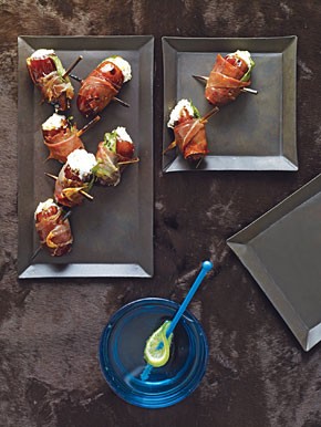 Dates with goat cheese wrapped in prosciutto