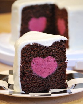 Deep chocolate cake with a raspberry mousse heart