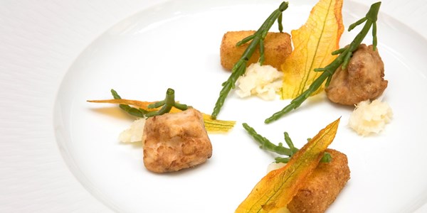Deep-fried calf's brain with lemon kimchi and courgette flowers