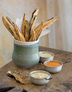 Deep-fried eggplant sticks with three fresh purées (Tres salmorejos y berenjenas fritas)