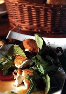 Deep-fried Lowna Dairy goats' cheese with a salad of bull's blood and Ascroft's beetroot, Harome honey and walnut dressing