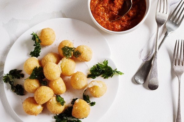 Deep-fried mozzarella balls with smoky tomato sauce