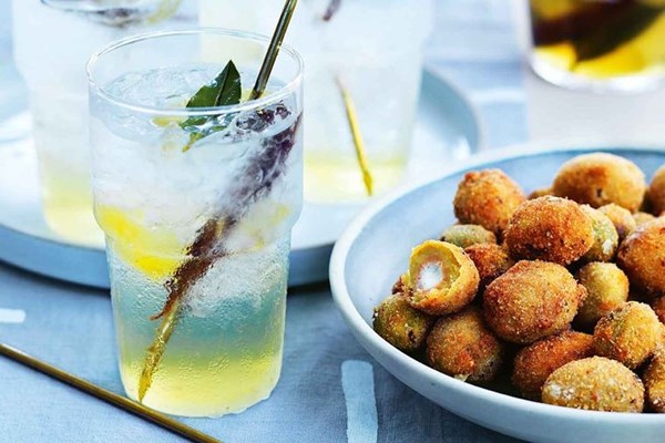 Deep-fried olives stuffed with vermouth-whipped feta