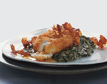 Deep-fried poached eggs with creamed spinach and serrano ham