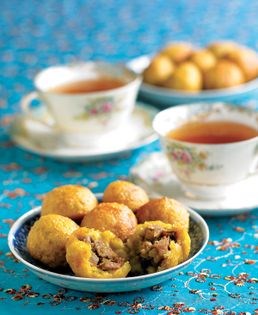 Deep-fried sweet potato balls stuffed with kueh chang filling (Kueh kledek)