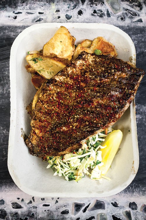Deviled bluefish with fried potatoes and coleslaw