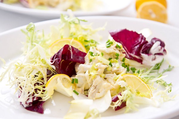 Deviled crab meat and chicory salad with egg dressing