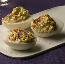 Deviled eggs with capers, red onion, and dill 