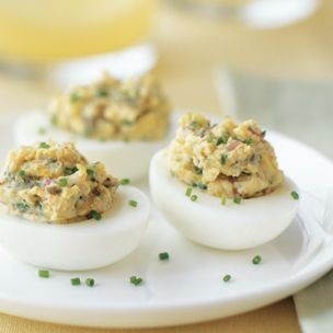 Deviled eggs with lemon zest, chives, and capers