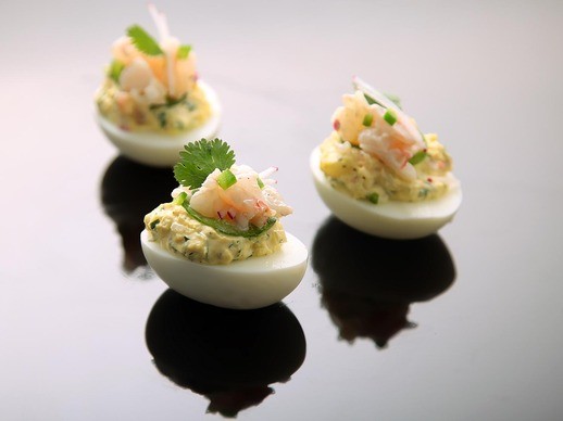 Deviled eggs with shrimp, jalapeño, and radish
